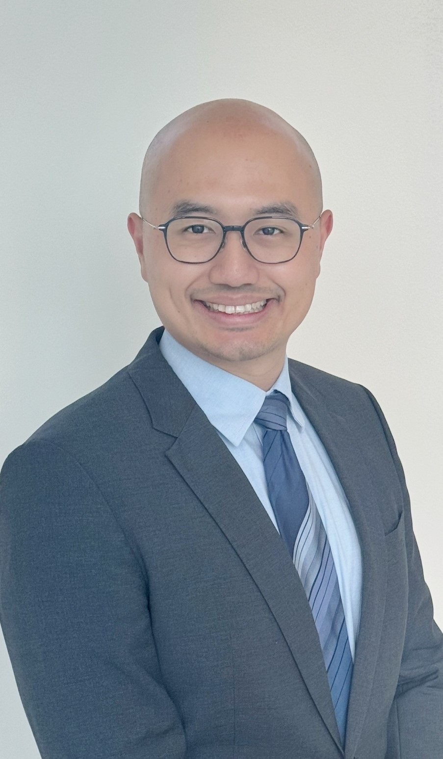 Photo of man with glasses. Dr. Terrence Li
